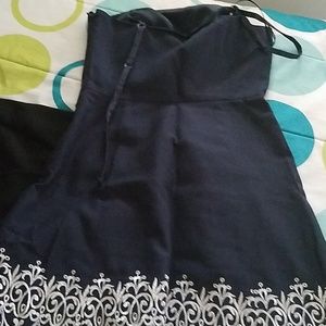 Sleeveless dress navy blue with embroidered hem